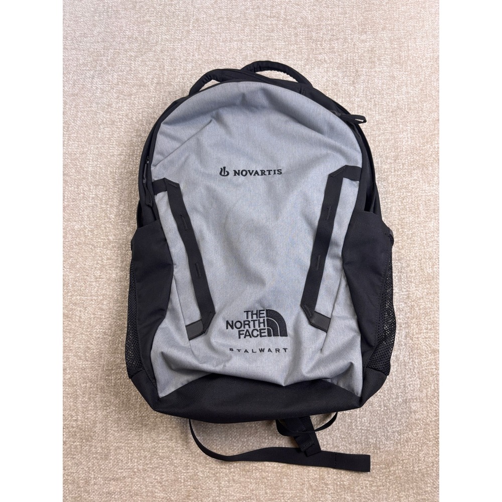 The North Face Stalwart Backpack Grey Black Novartis Logo Laptop Bag NF0A52S7
